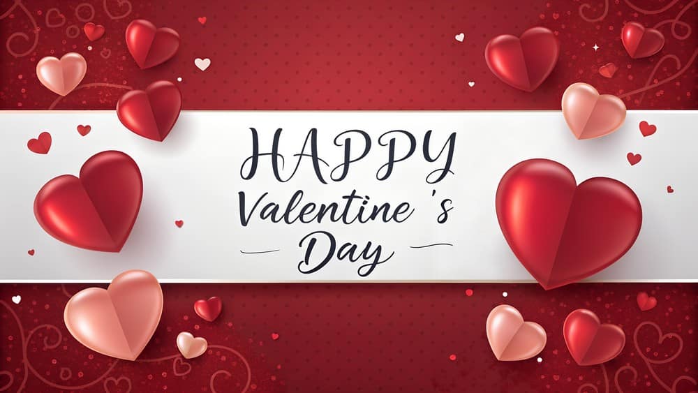 Happy Valentine's Day greeting card with red and pink hearts