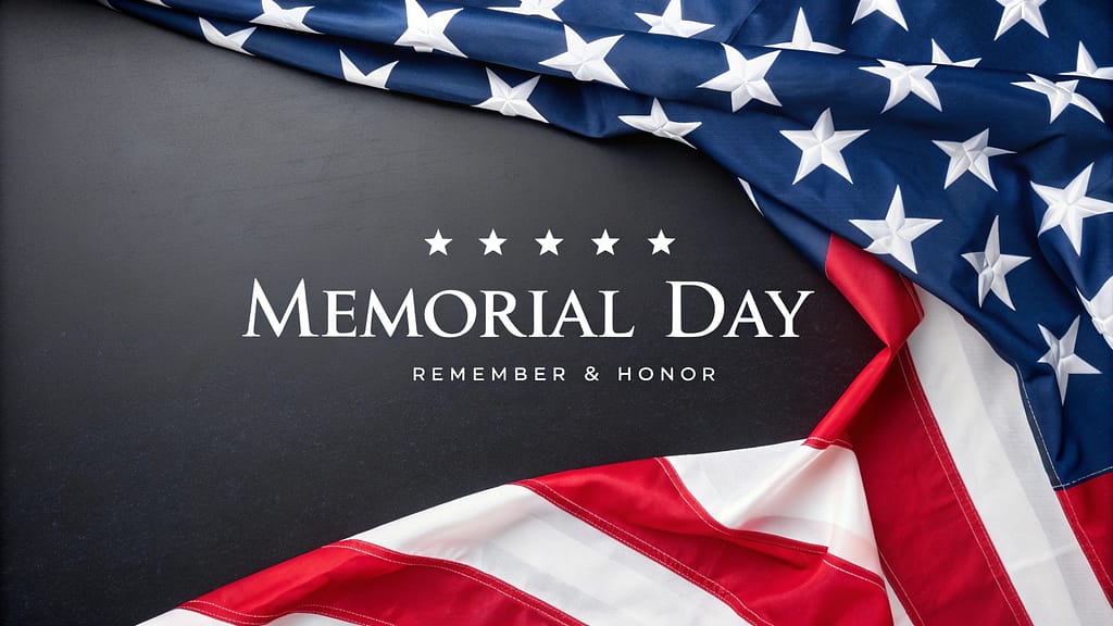 American flag draped on a dark background with Memorial Day text and remembrance message