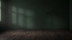 Dark moody empty room interior background with dark green wall and rustic wooden floor