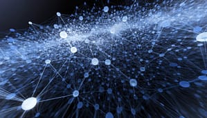 Abstract blue network technology background featuring glowing nodes and data connections